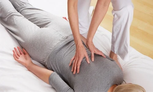 Wearing comfortable clothing during a massage