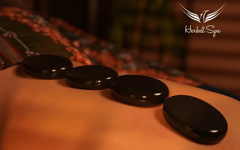 body massage with hot stone